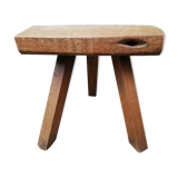 Old farm stool raw wood tripod