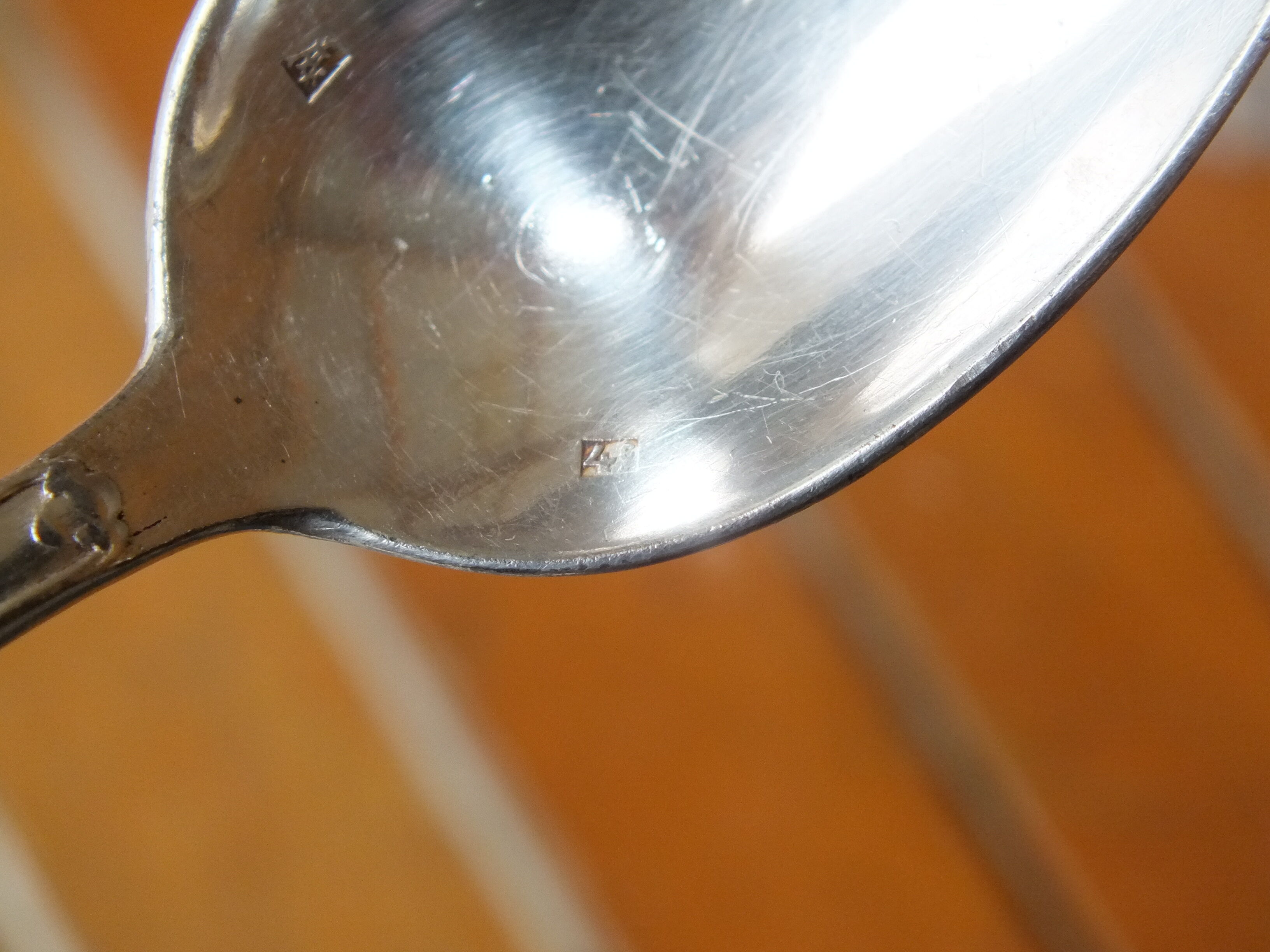 15 small silver metal spoons with rows of beads