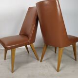 8 brown skai chairs 1950