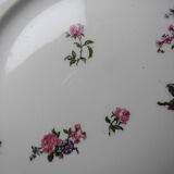 4 flat plates by Bernardaud, Limoges porcelain, floral decoration from the 1920s to 1950s.