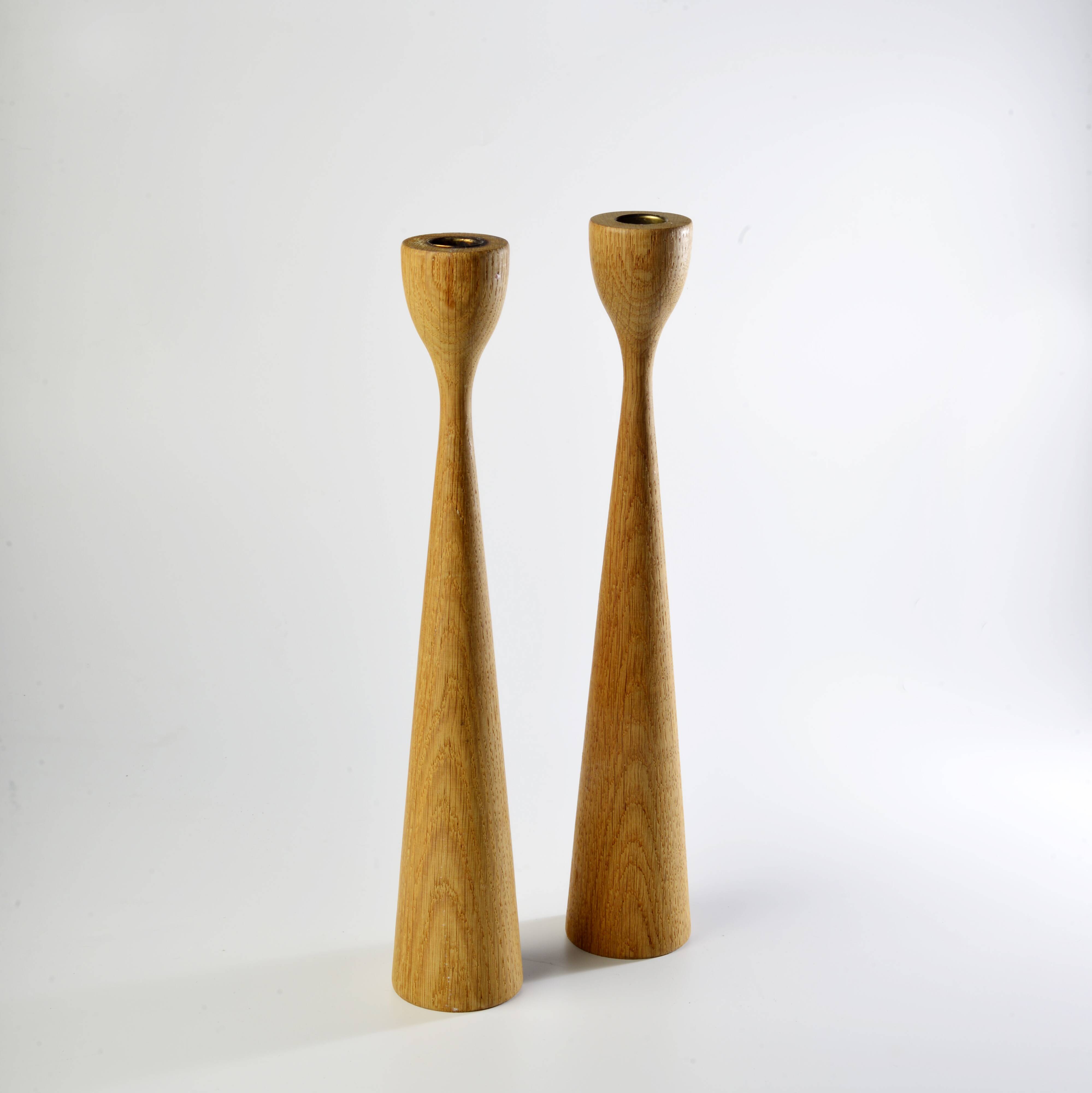 Pair of teak candle holders