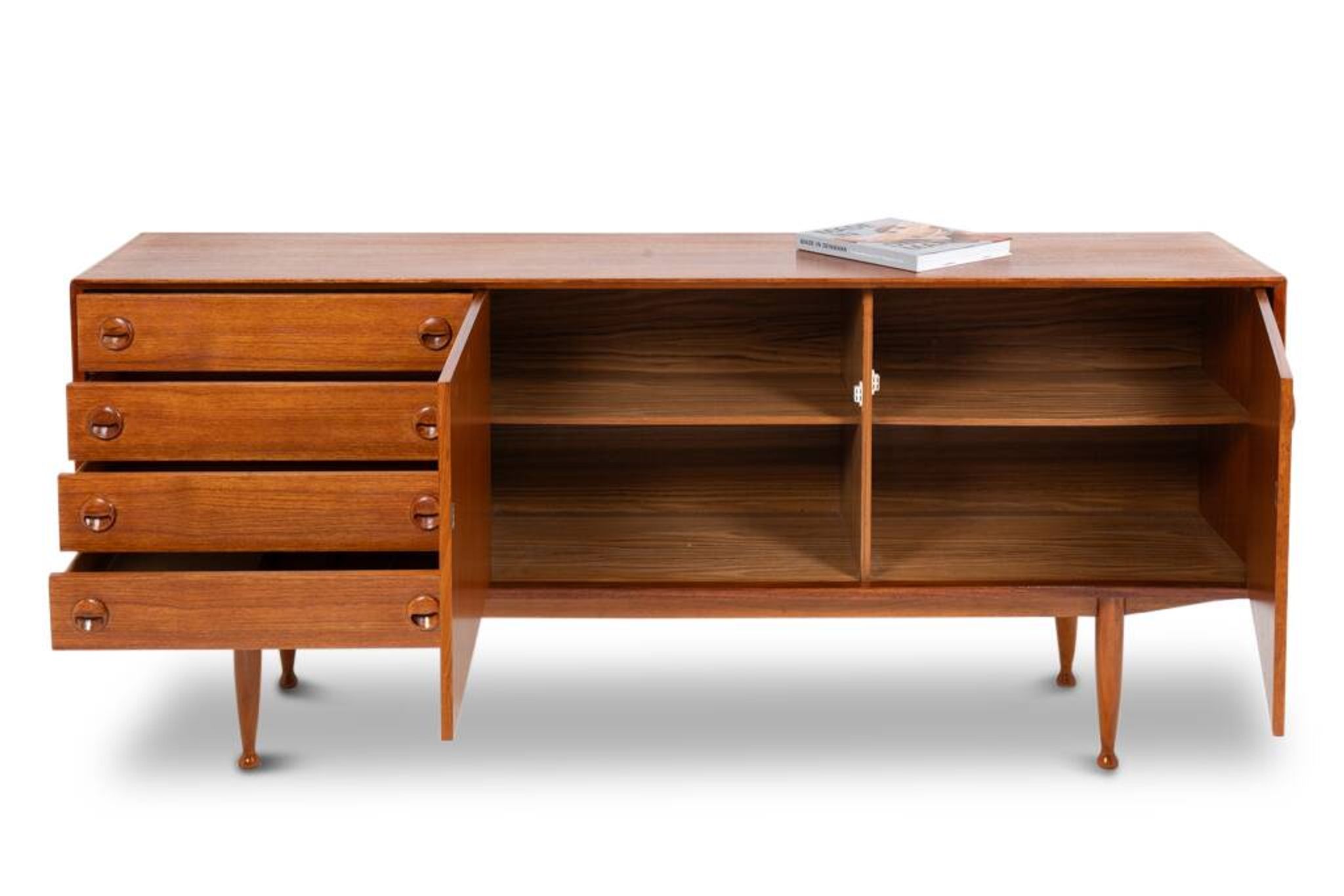 Teak sideboard, with four drawers and two doors. 20th century.