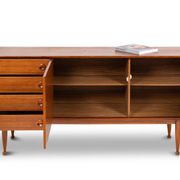 Teak sideboard, with four drawers and two doors. 20th century.