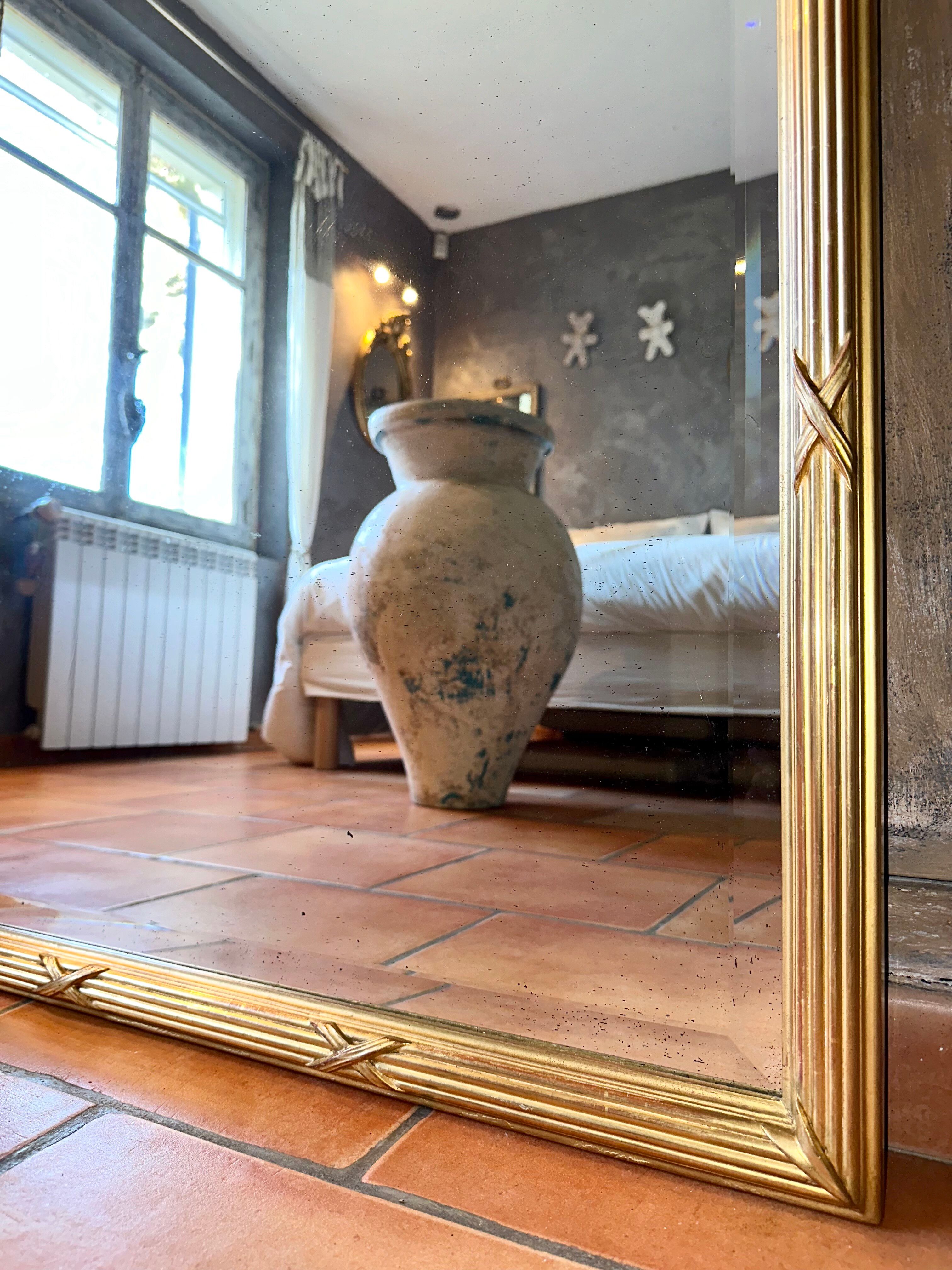 Antique mirror with a gilded pediment Louis XVI
