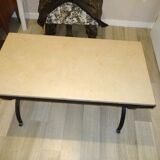 Wrought iron coffee table and beige marble top