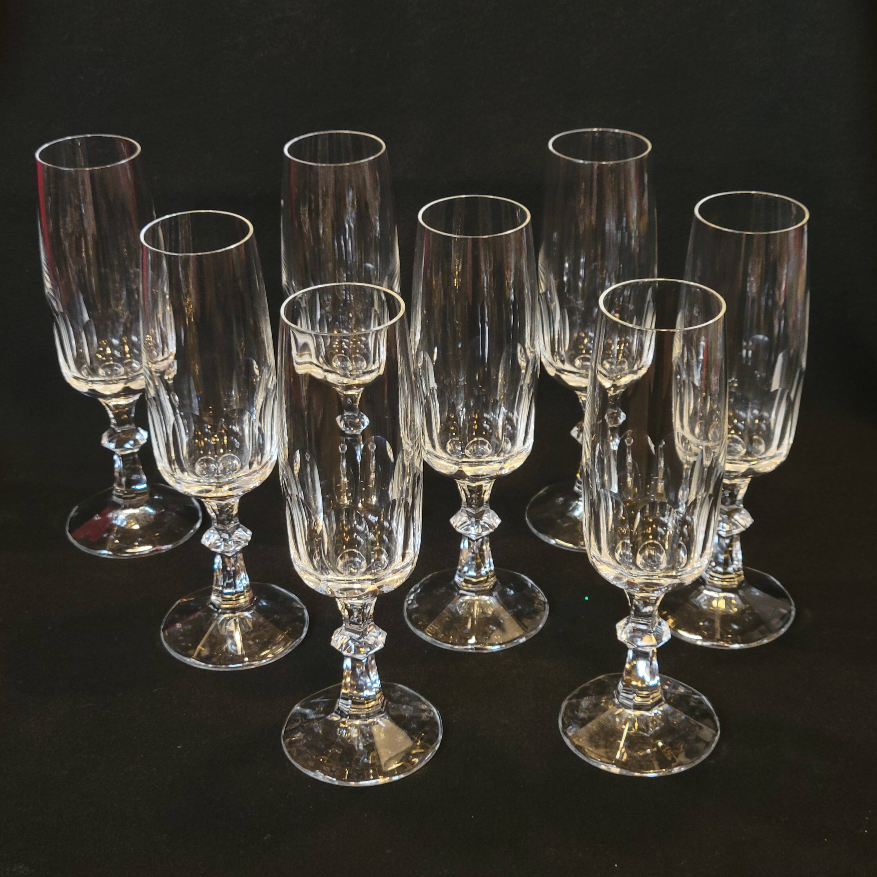 8 champagne flutes in flat cut crystal