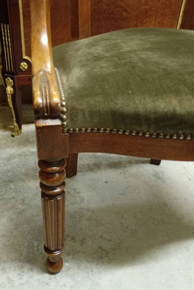 Empire-Charles X walnut office chair with a gondola backrest.