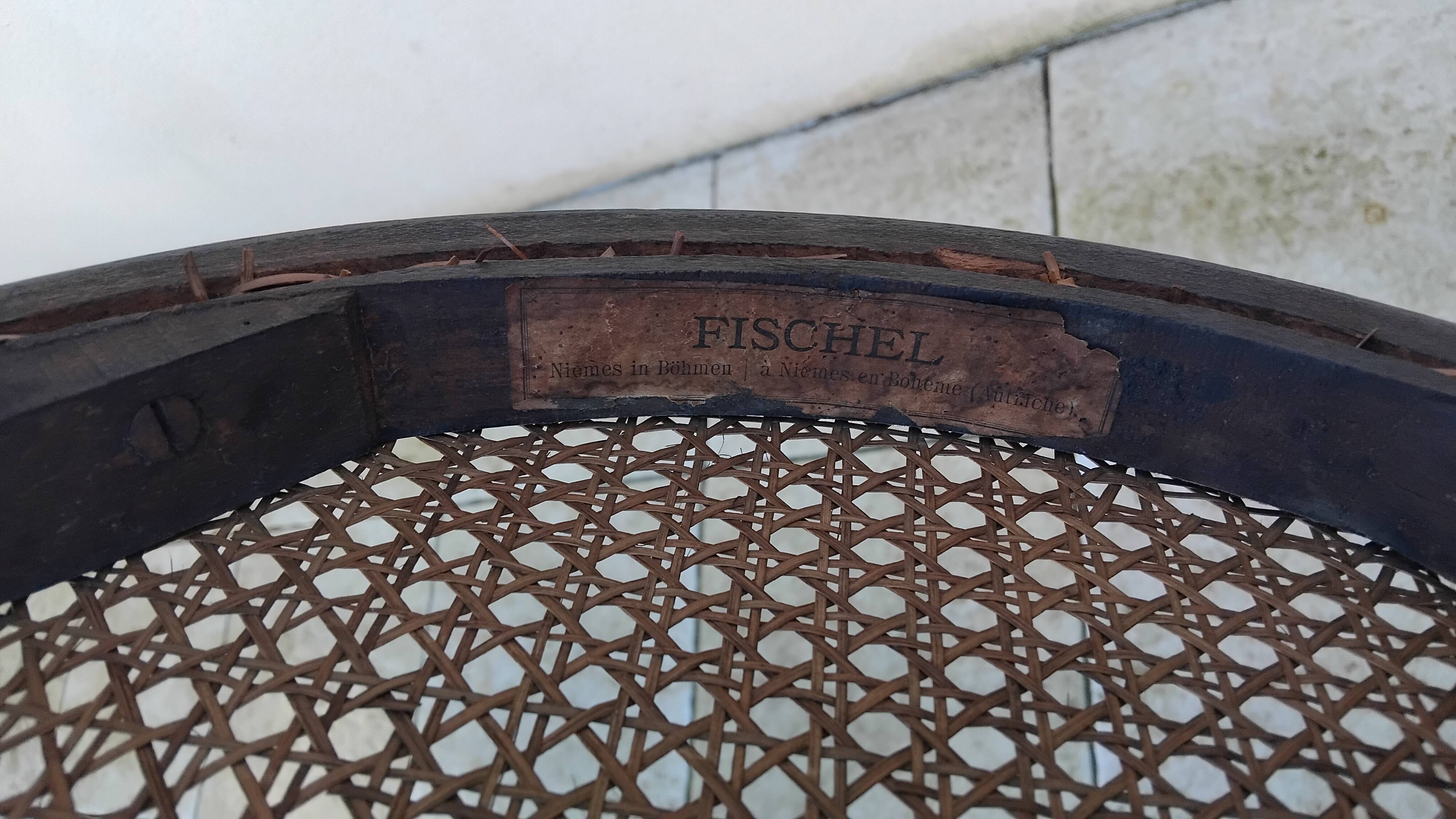 Old caned bistro chair fischel