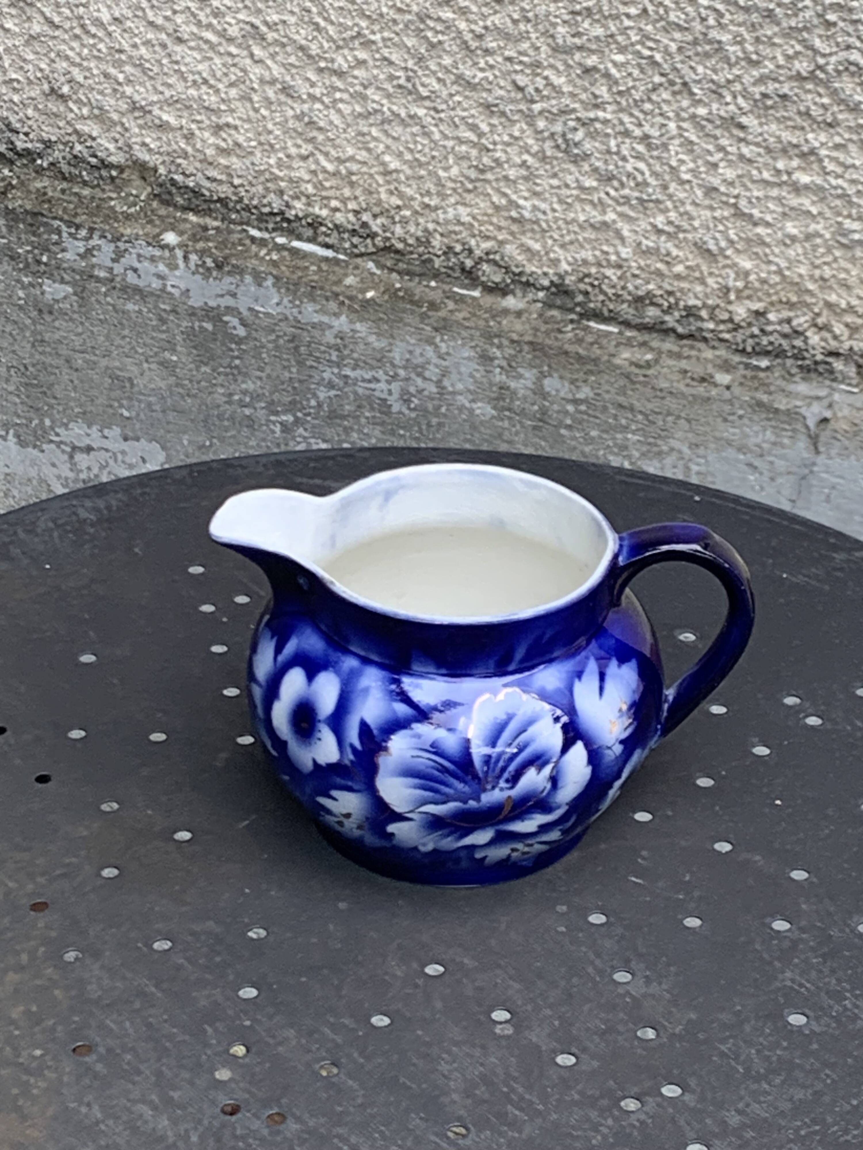 Milk jug with blue and gold peony pattern, made in England,