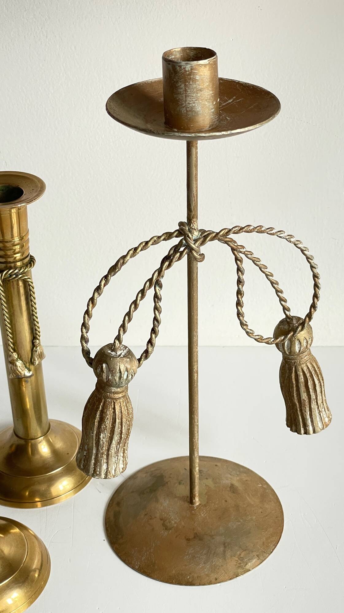 Trio of vintage knotted candlesticks brass