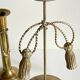 Trio of vintage knotted candlesticks brass