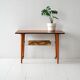 Vintage Scandinavian coffee table in teak with brass shelf