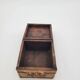 Old jewelry box in wood and gilded stucco