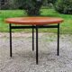 Vintage round table in blond mahogany by Gérard Guermonprez Editor Magnani, metal base