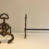 Pair of neoclassical andirons in bronze and wrought iron