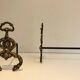 Pair of neoclassical andirons in bronze and wrought iron
