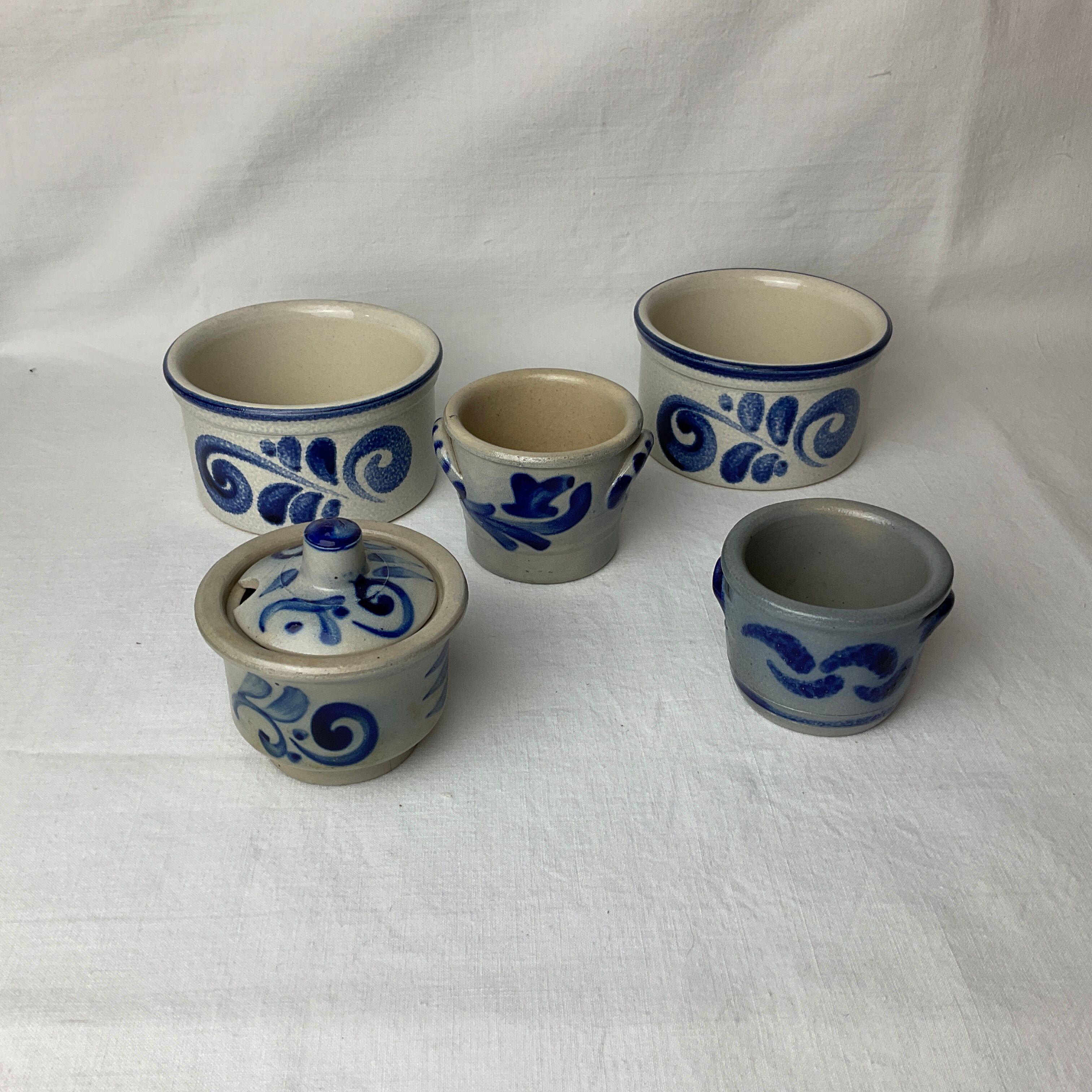 Series of 5 small blue sandstone pots