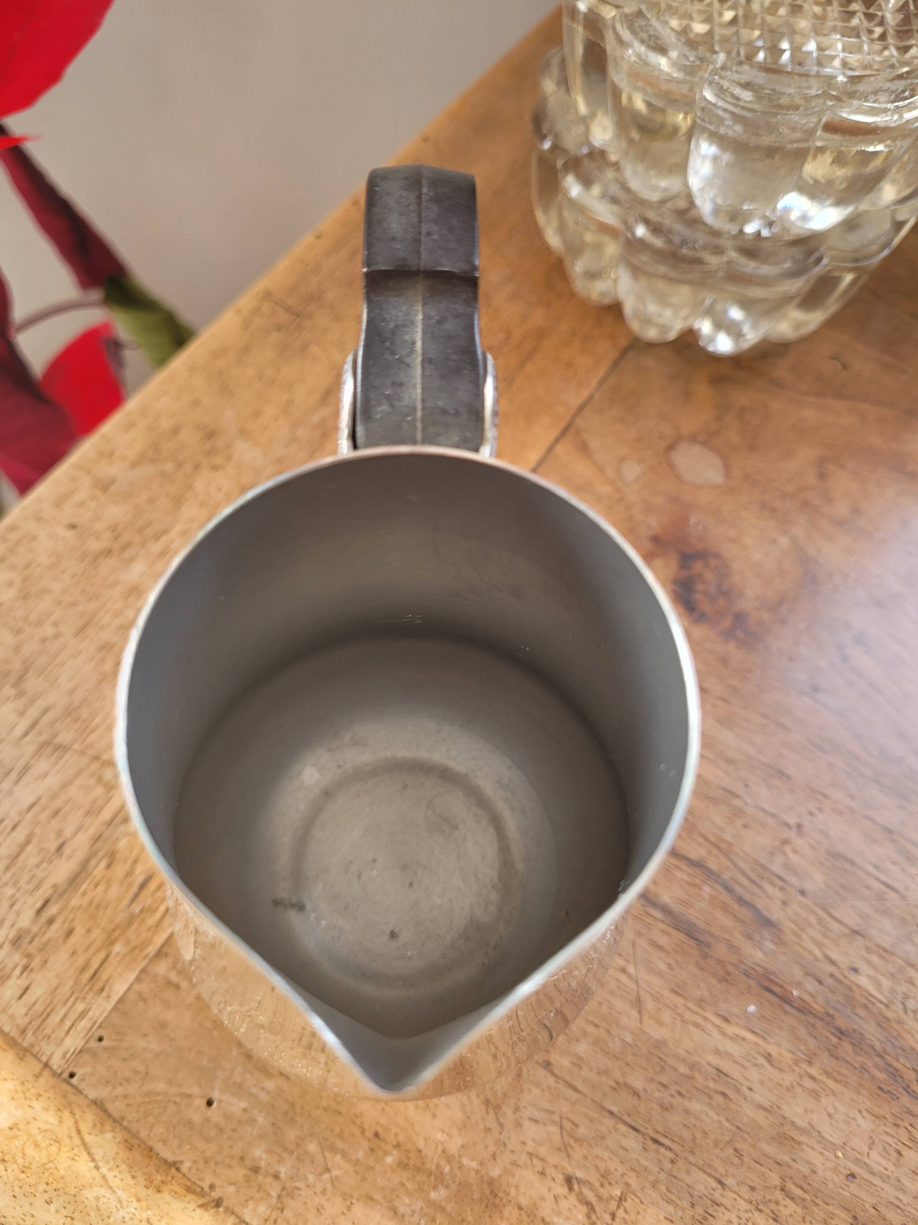 Vintage stainless steel milk jug