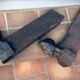 Pair of cast-iron chenet characters with laurels