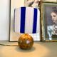 Vintage table lamp with pyrite sandstone base and striped wool lampshade