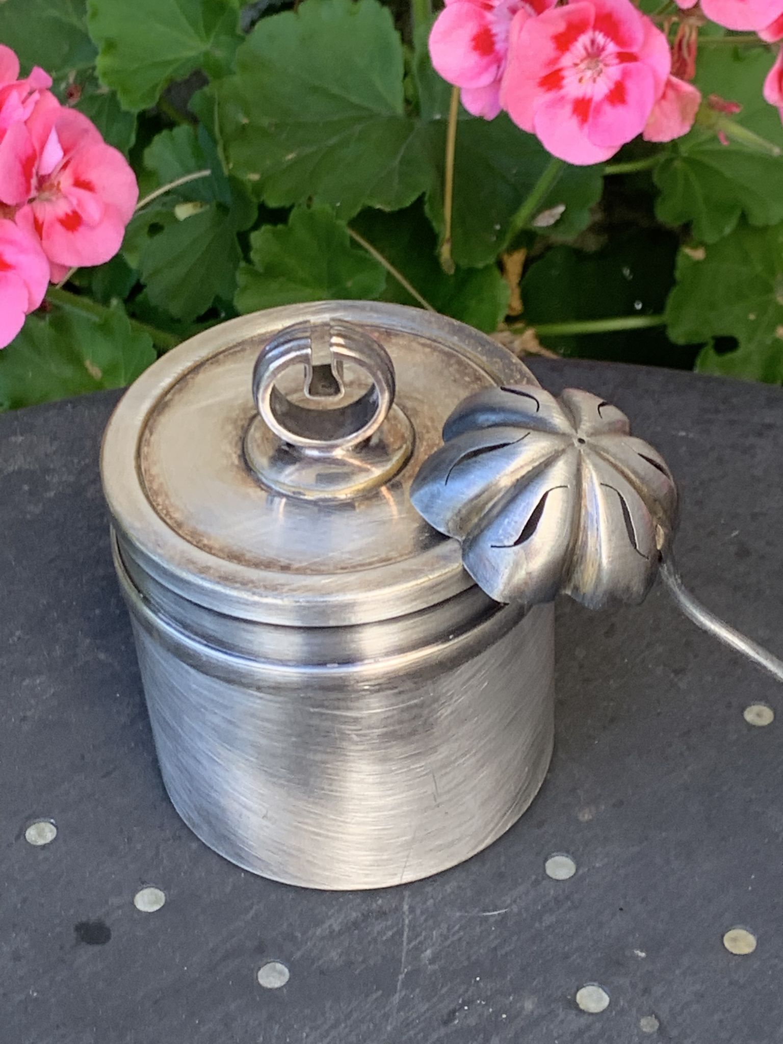 Sprinkling spoon and art deco sugar pot in silver metal