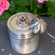 Sprinkling spoon and art deco sugar pot in silver metal