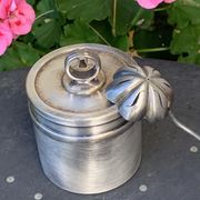 Sprinkling spoon and art deco sugar pot in silver metal