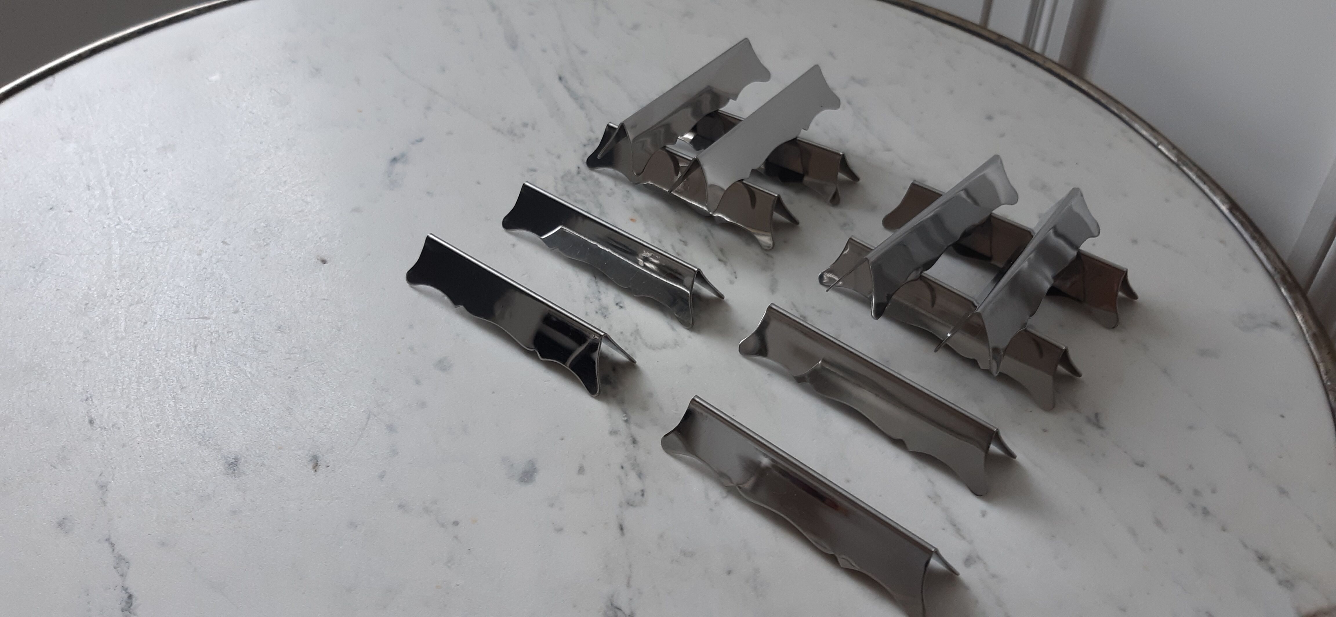 Set of 12 steel knife holders 50s