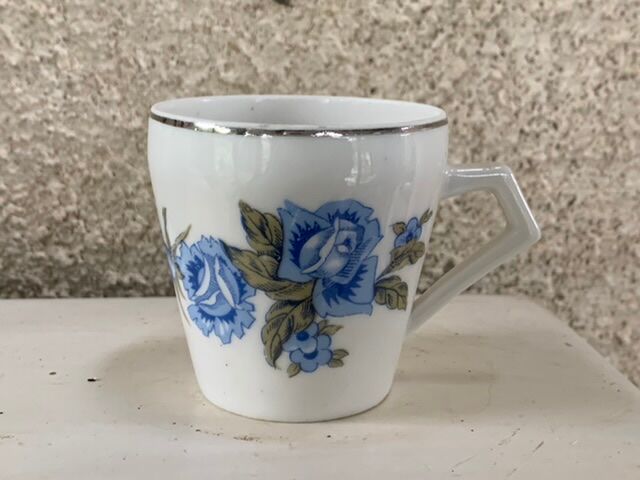 Coffee service in white porcelain pattern pink blue art deco