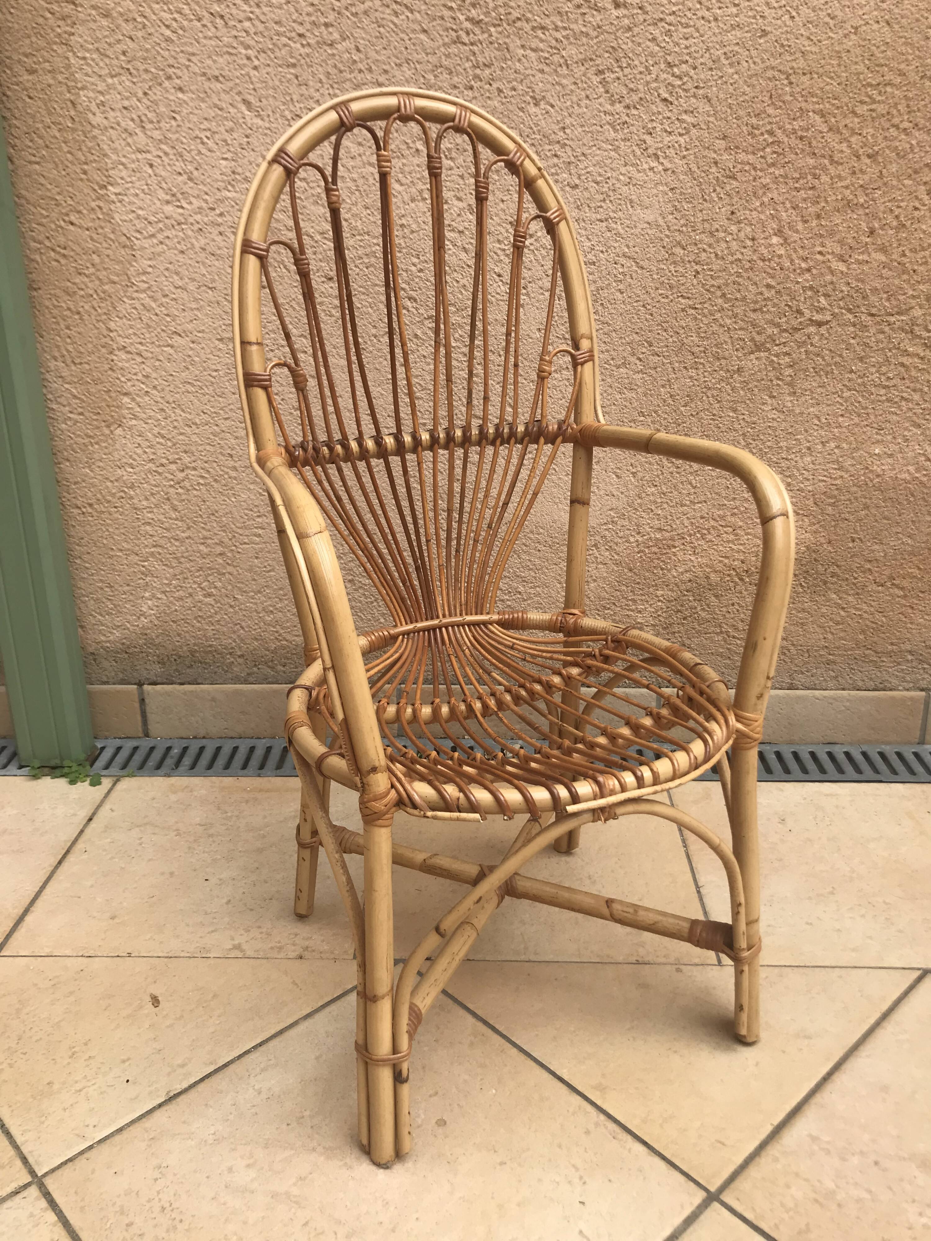 Rattan and glass dining table
