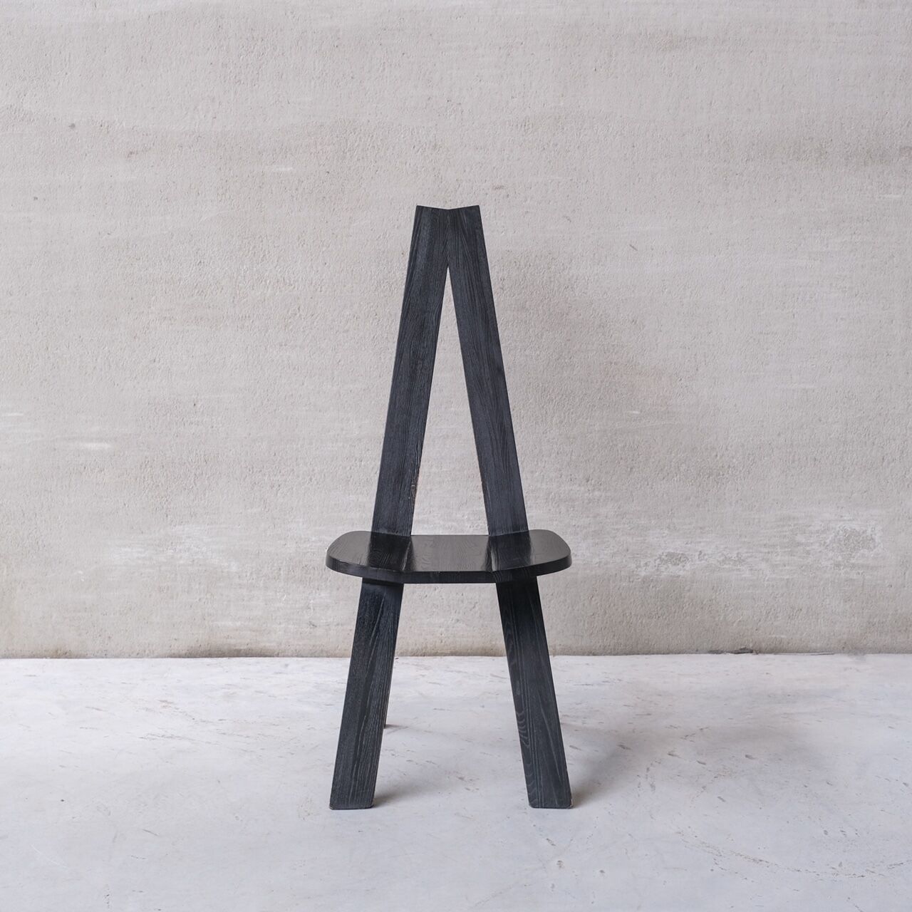 Set of six black dining chairs