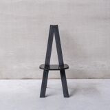 Set of six black dining chairs