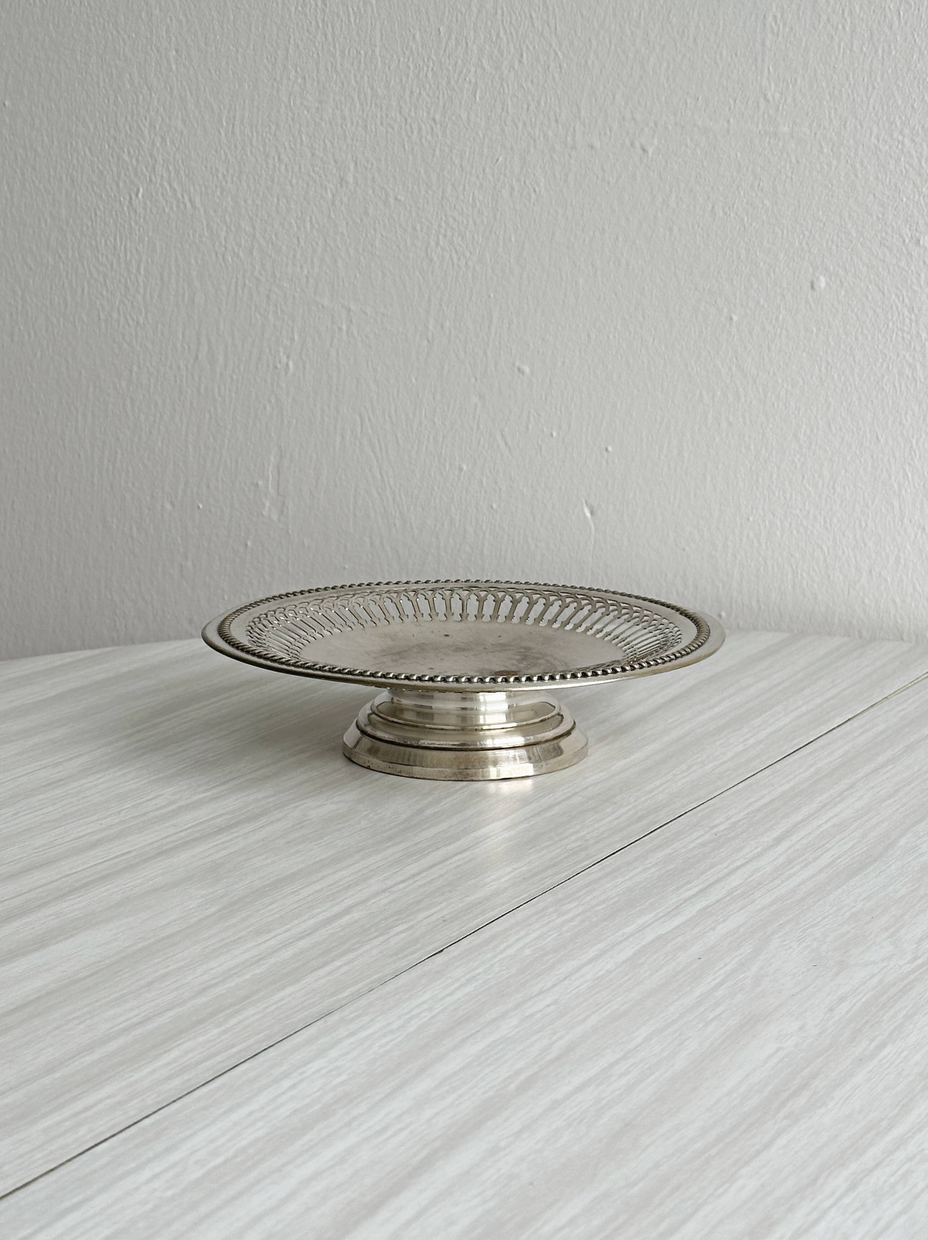 Patinated metal stand