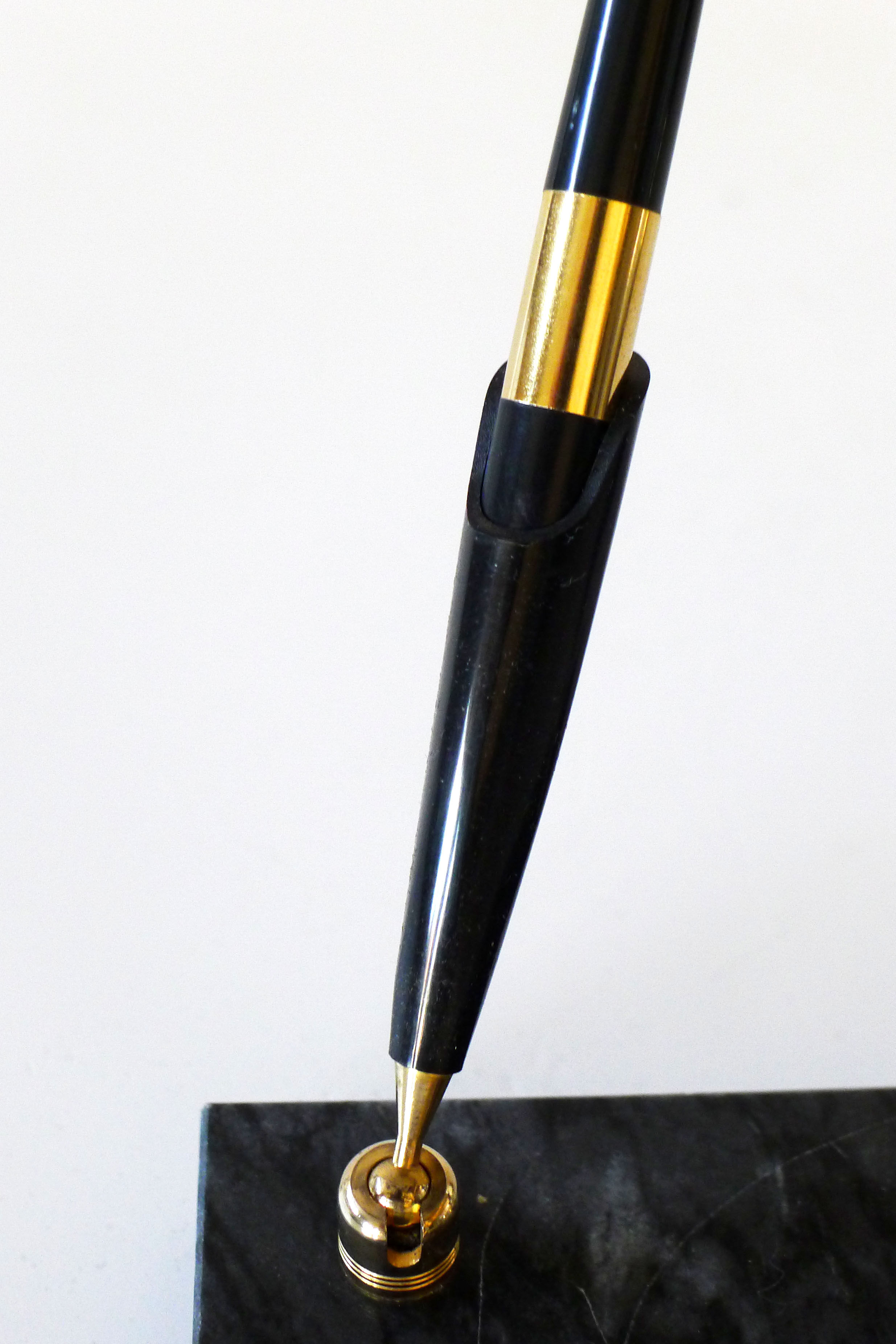 Pen doors on marble base