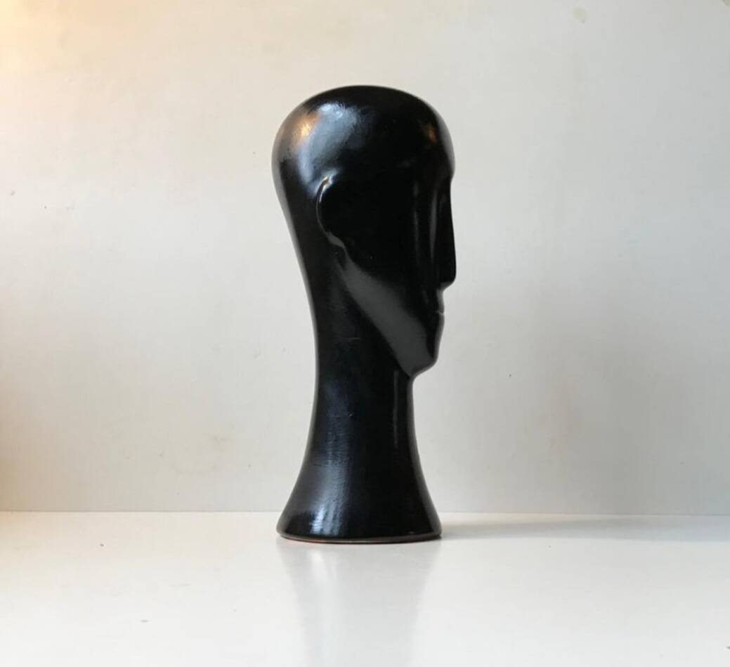 Modernist black ceramic sculpture – stylised head – 1960s