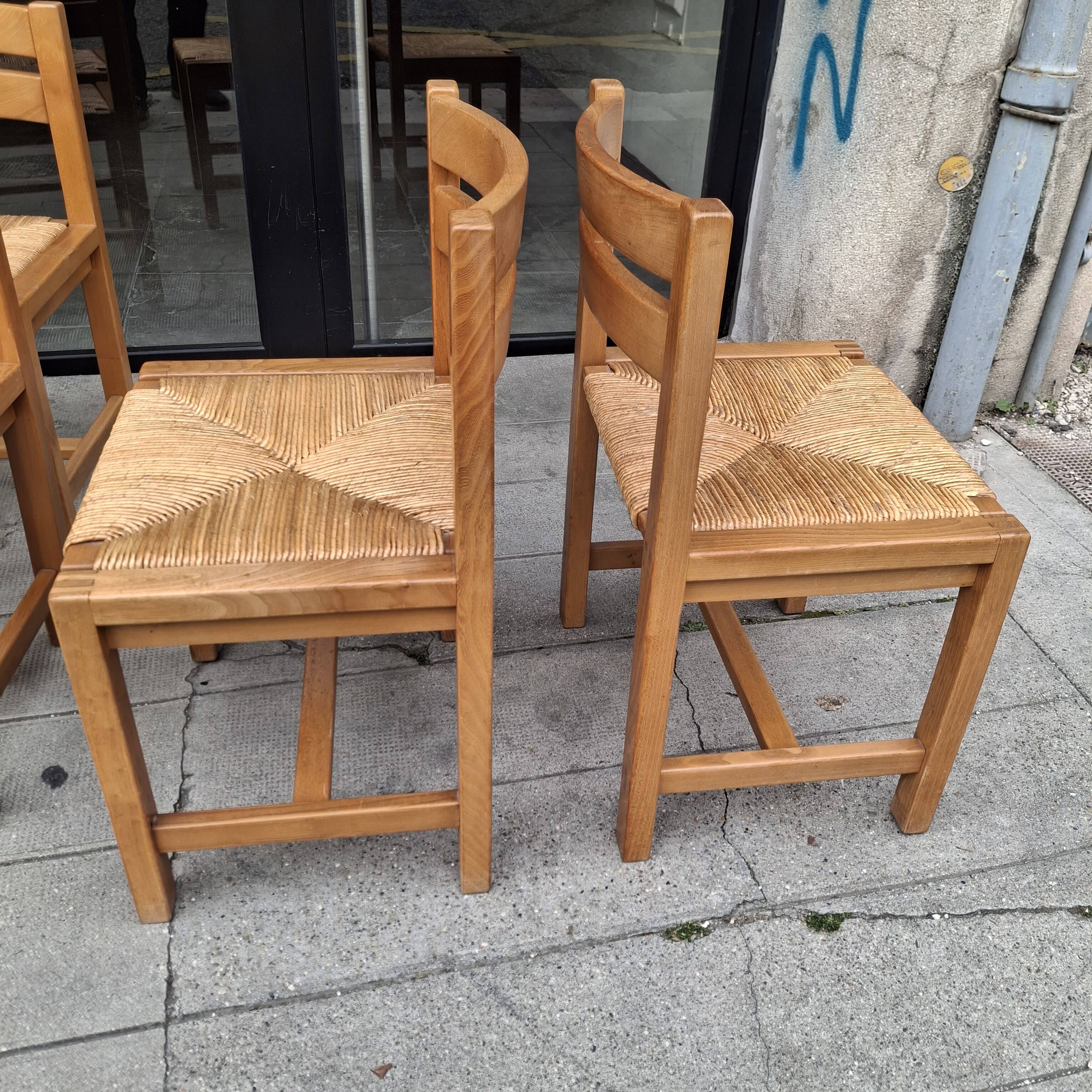 Set of four regaining chairs in elm. 1970