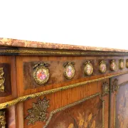 An antique French Louis XVI-style marble-top side cabinet
