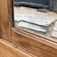 Art deco wardrobe in raw oak with bevelled mirror.
