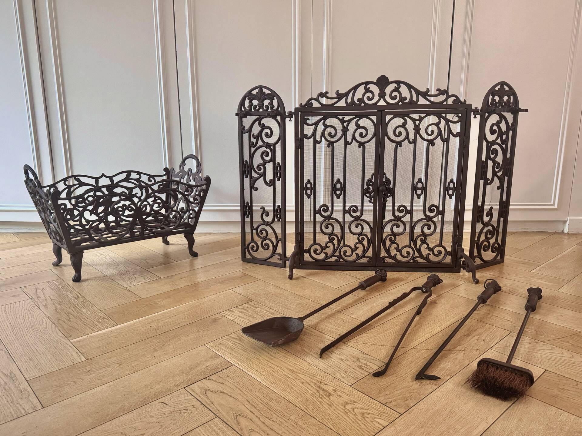 Wrought iron fire screen set with log basket, accessories.