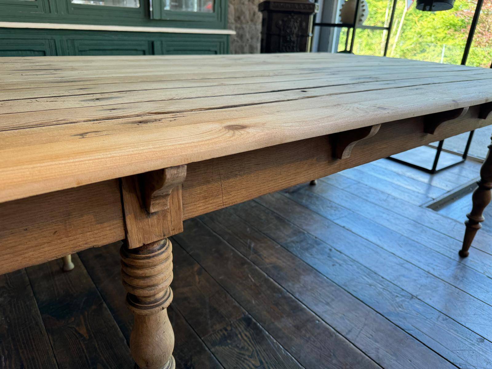 Large raw wood dining table