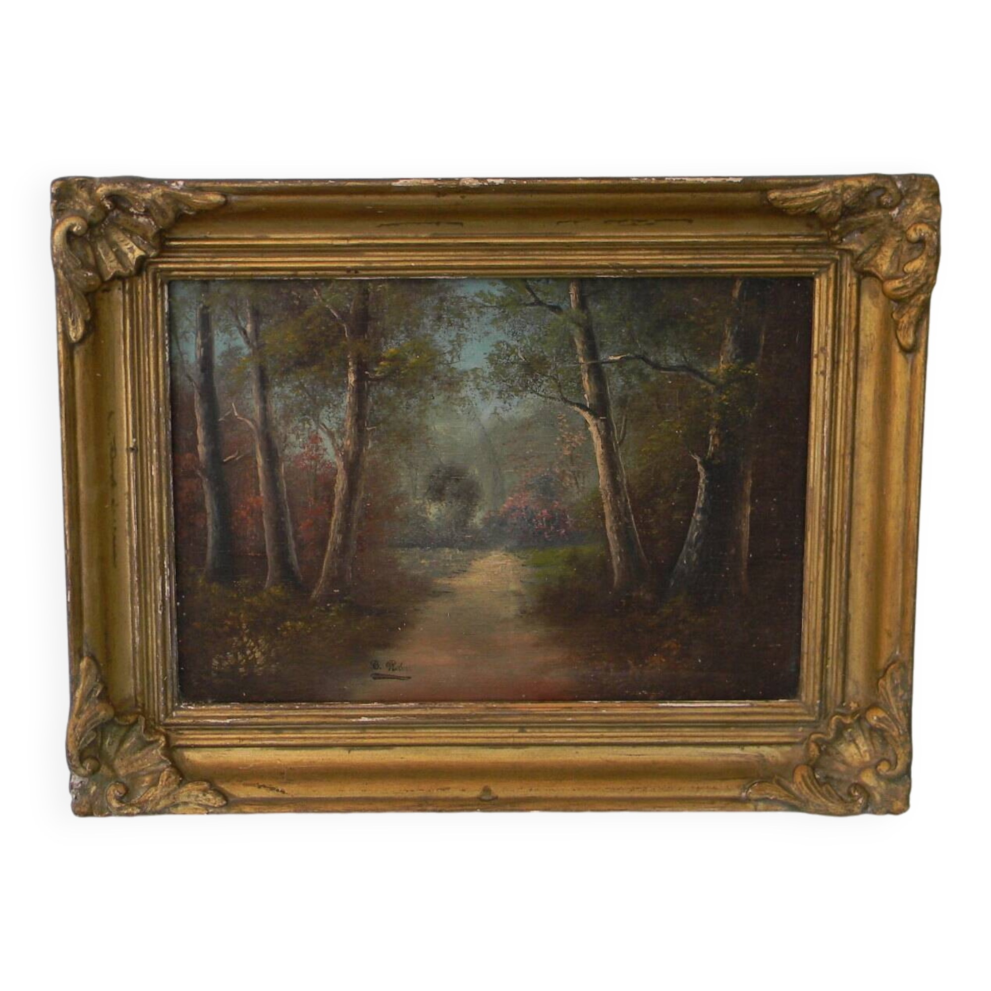 Old signed landscape painting under wood.