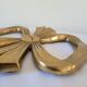 Brass ribbon bottom
