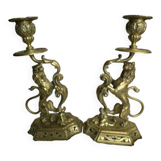 Pairs of candle holders in bronze (molded brass)