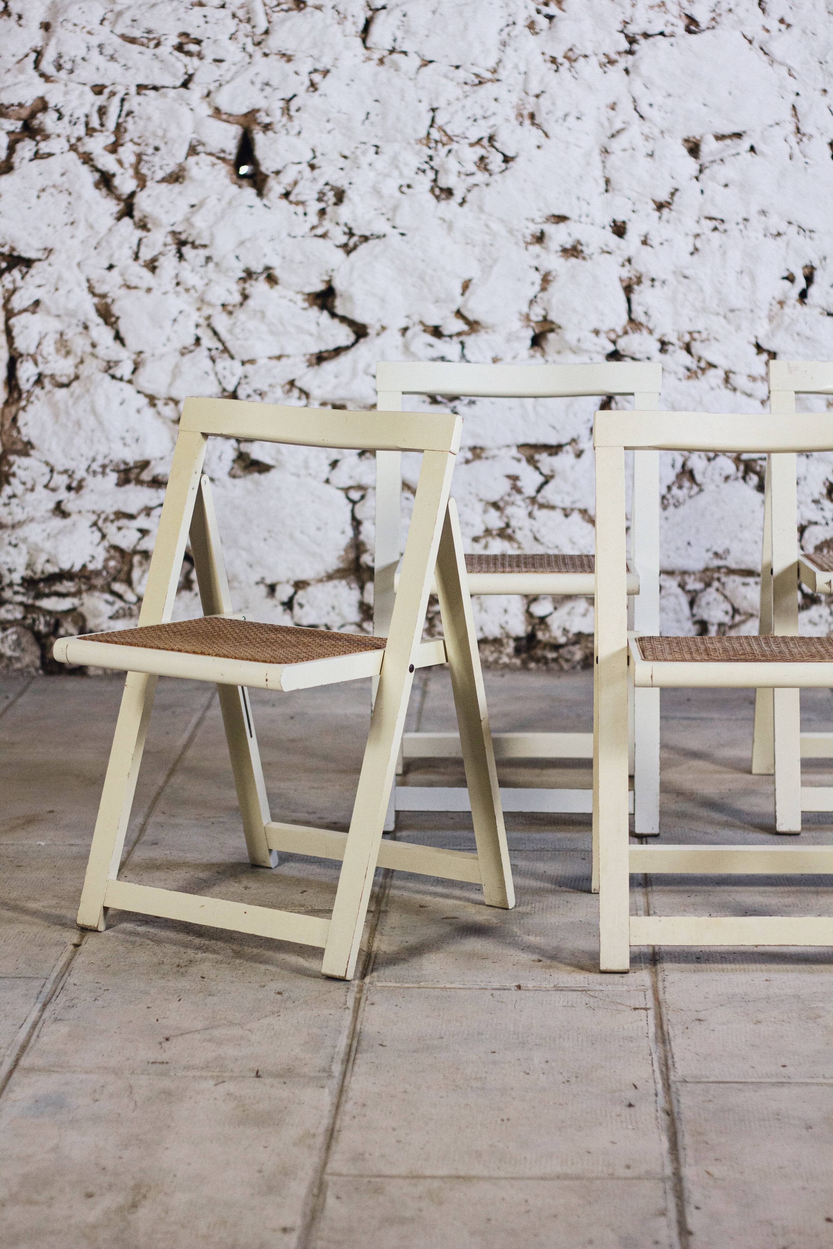 4 vintage folding cane chairs