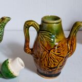 Set of old teapots and honey pot
