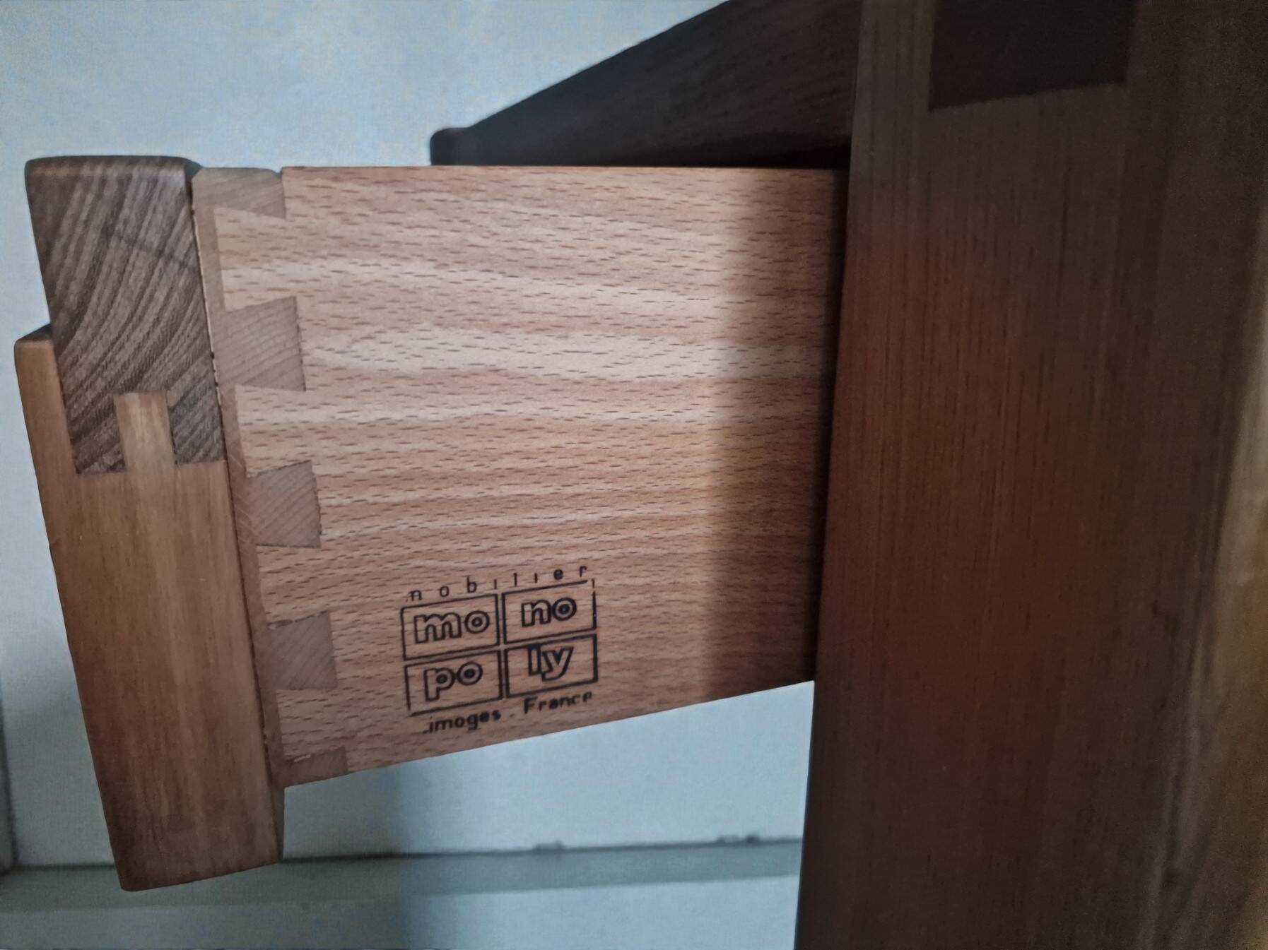 Monopoly-style elm bedside table regain