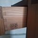 Monopoly-style elm bedside table regain
