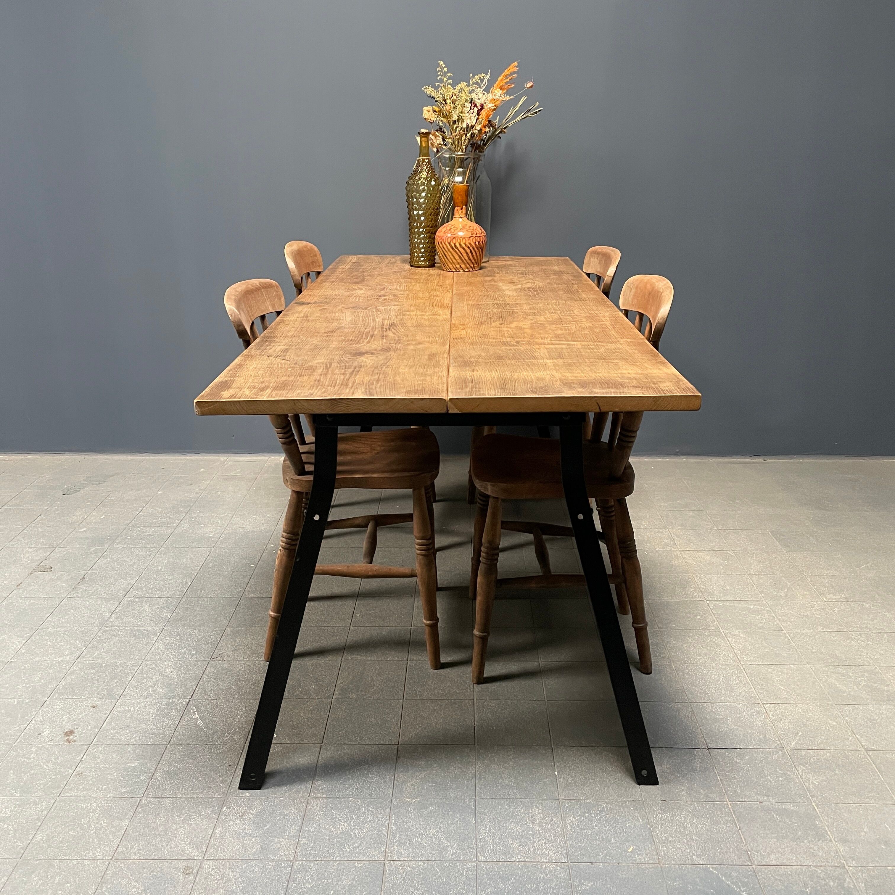 Handmade industrial oak dining table with black metal legs