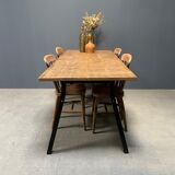 Handmade industrial oak dining table with black metal legs