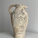 Poterie artisanale ancienne à tête de mouton